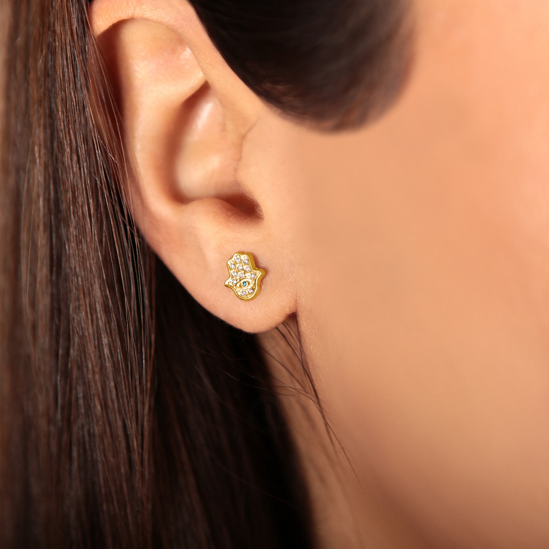 Ohrstecker 750/18 K Gelbgold Fatima-Hand mit Blautopas und Zirkonia