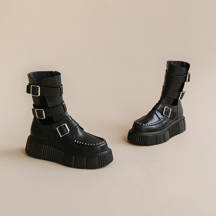 Boots à plateformes et sangles  en cuir noir