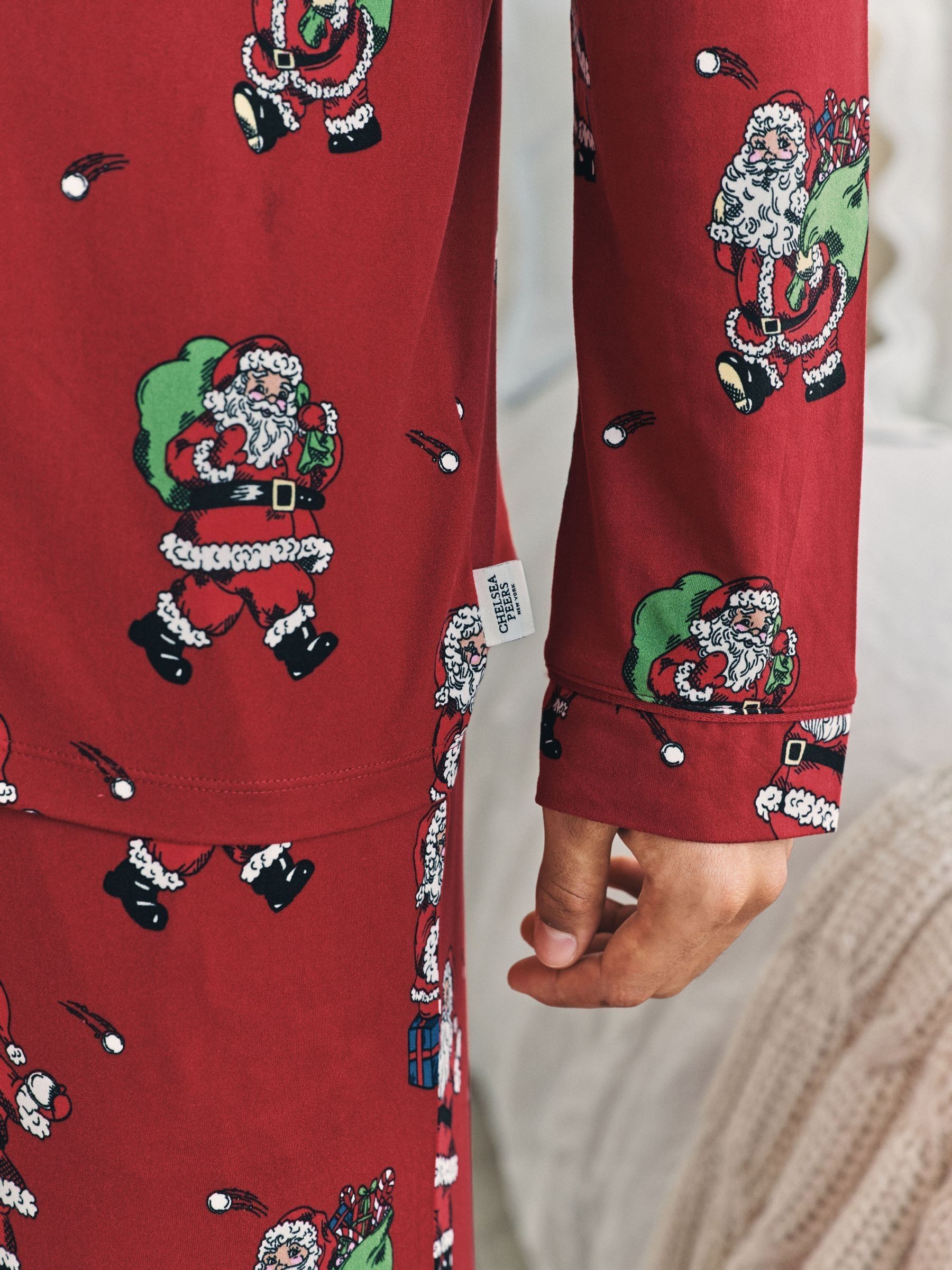 Chelsea Peers lange kerstpyjama met kerstman, sneeuwbalprint