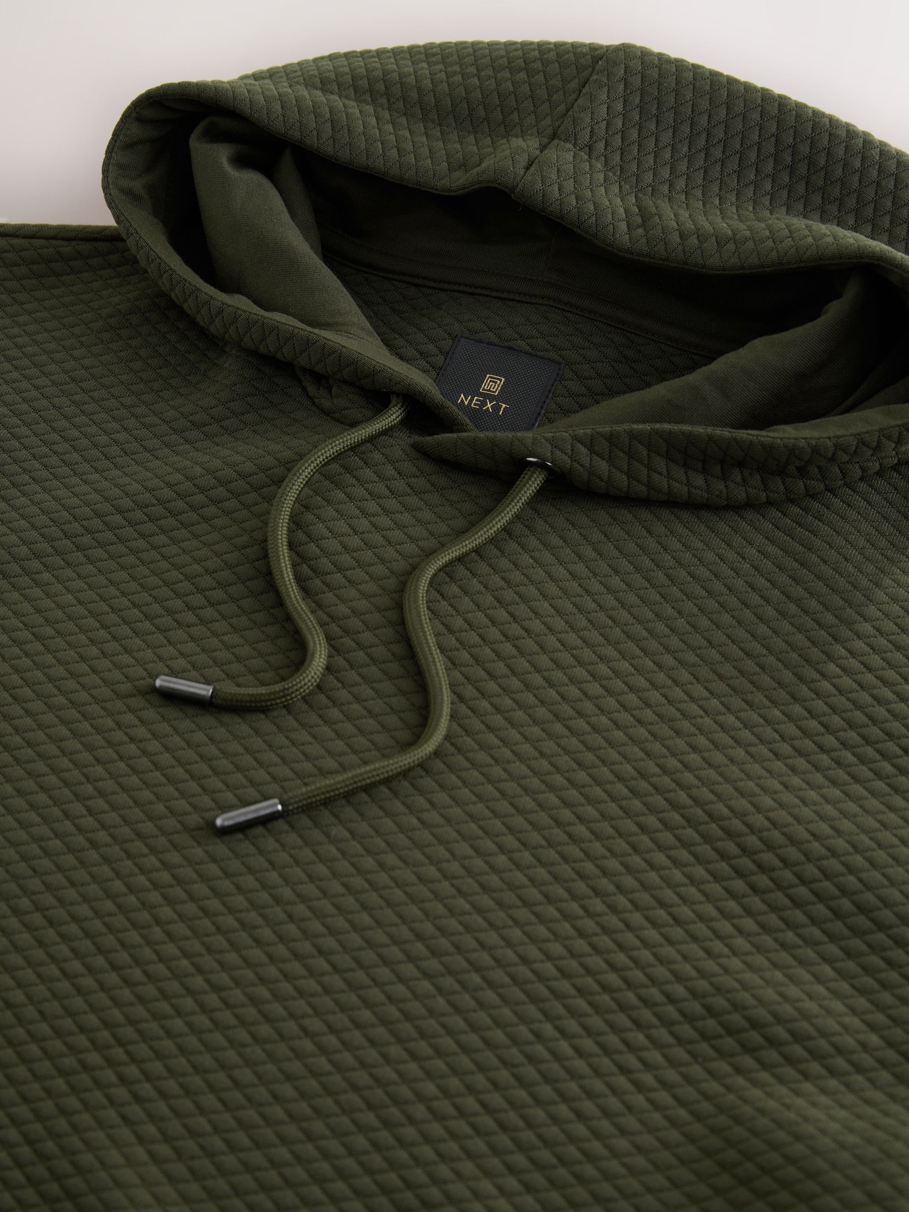 Kakigroen - Pullover-hoody met textuur