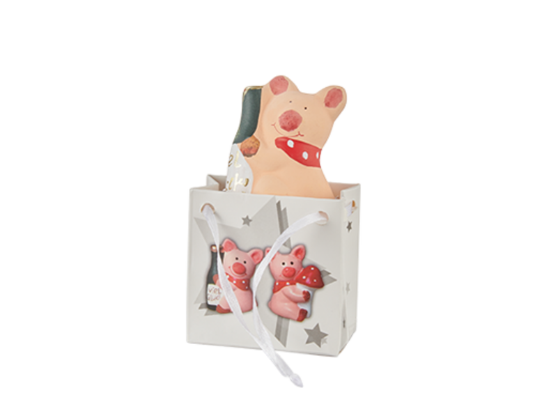 Glücksfigur in Geschenktasche
