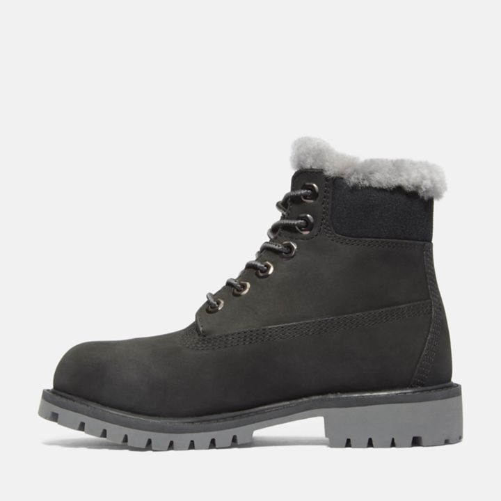 Bota de inverno Timberland Premium de 6 polegadas para jovens, na cor preta.