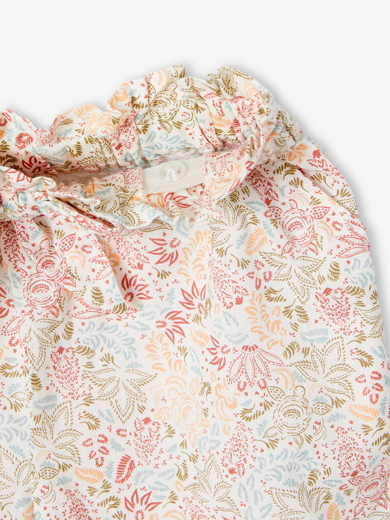 Conjunto feminino: regata e shorts com estampa exótica de rosa antigo.