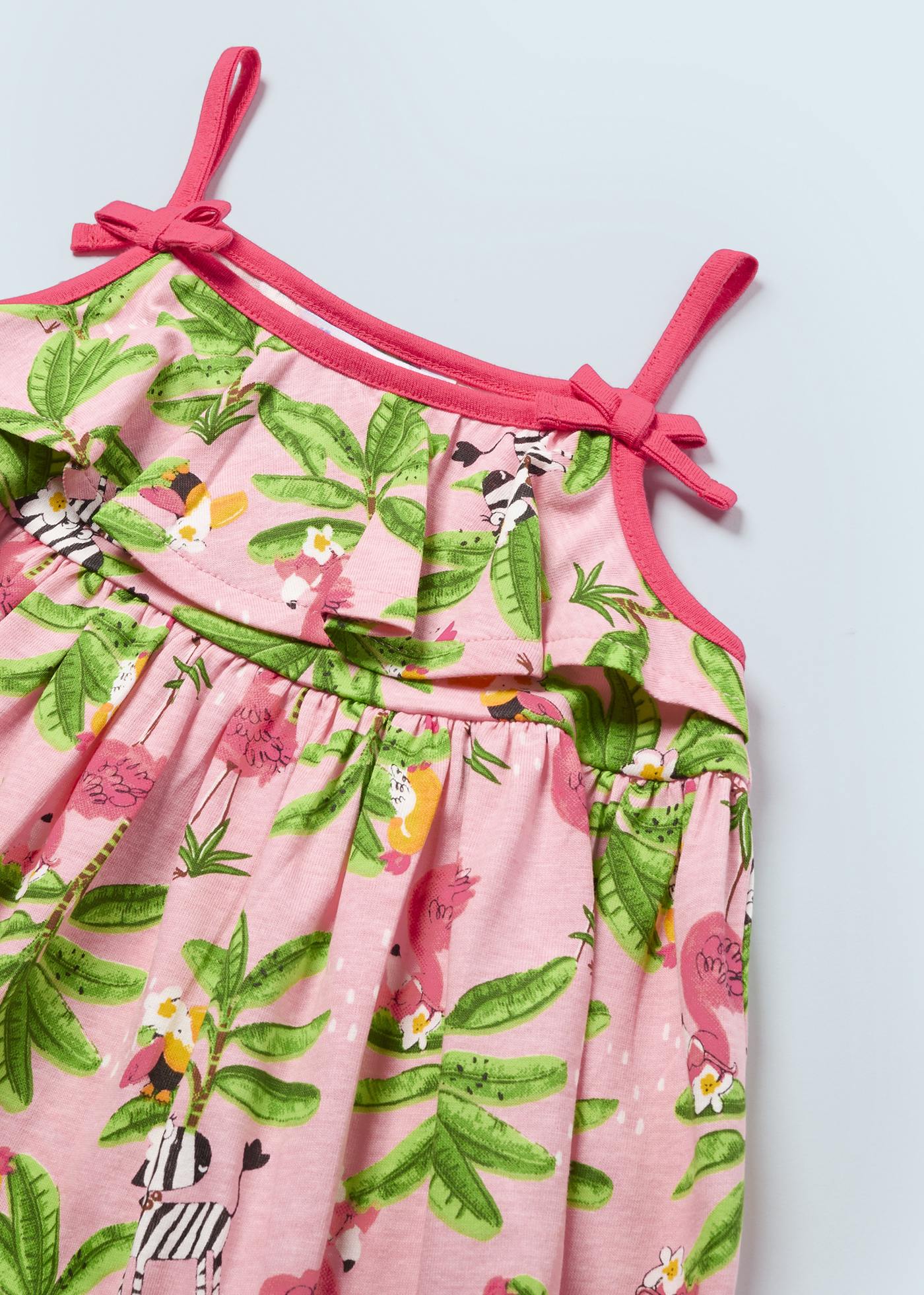 Vestido com estampa tropical feito de algodão sustentável para bebê