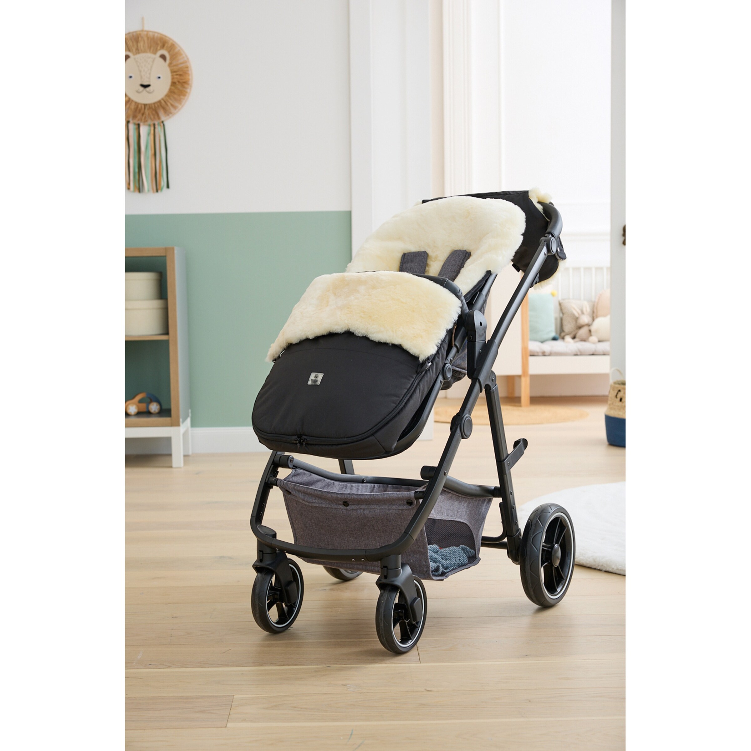 babycab Lammfell-Fußsack Skaidi für Kinderwagen, Buggy schwarz