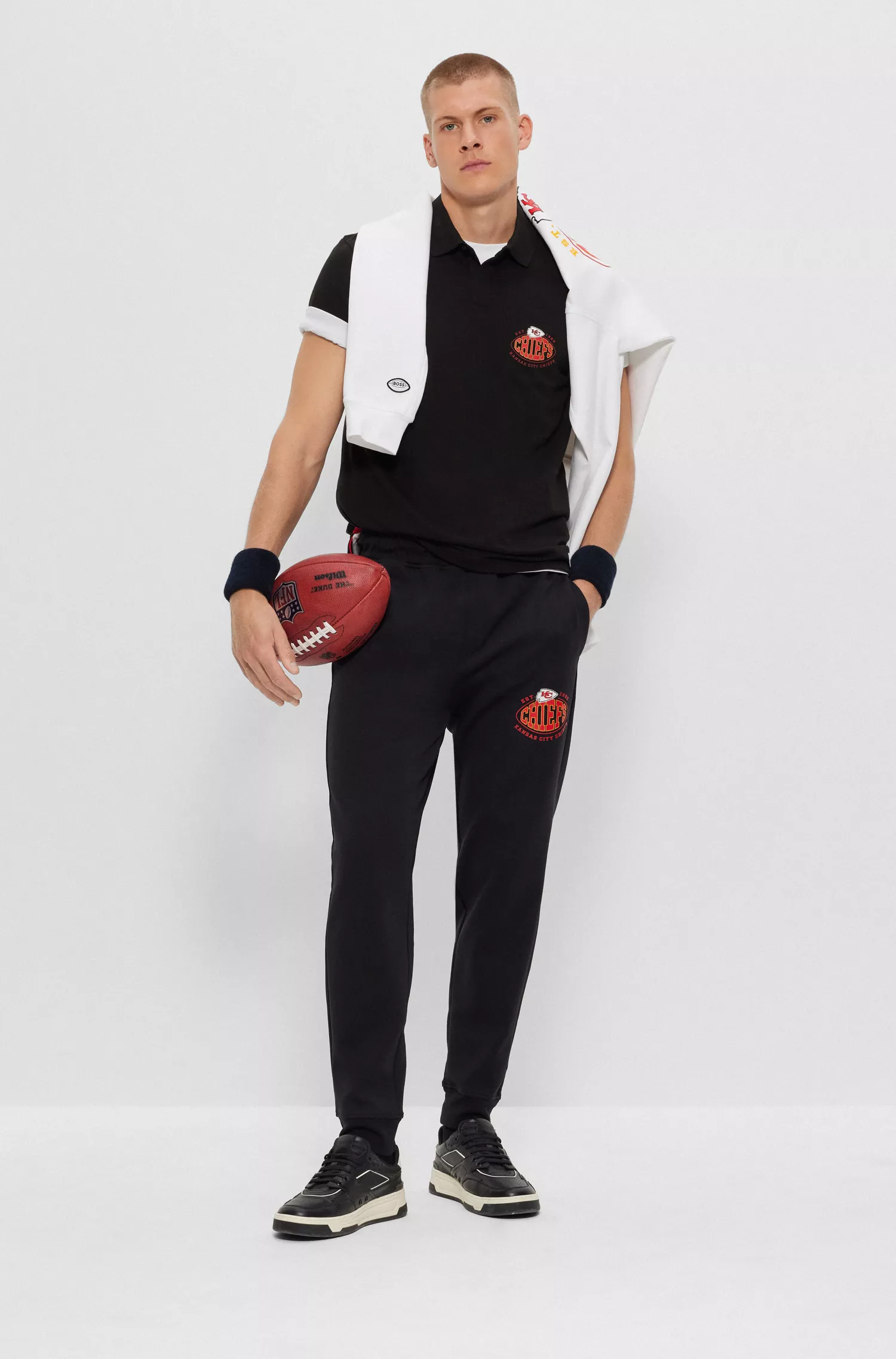 Camisa polo BOSS Orange-BOSS x NFL em algodão piqué com estampa da colaboração.