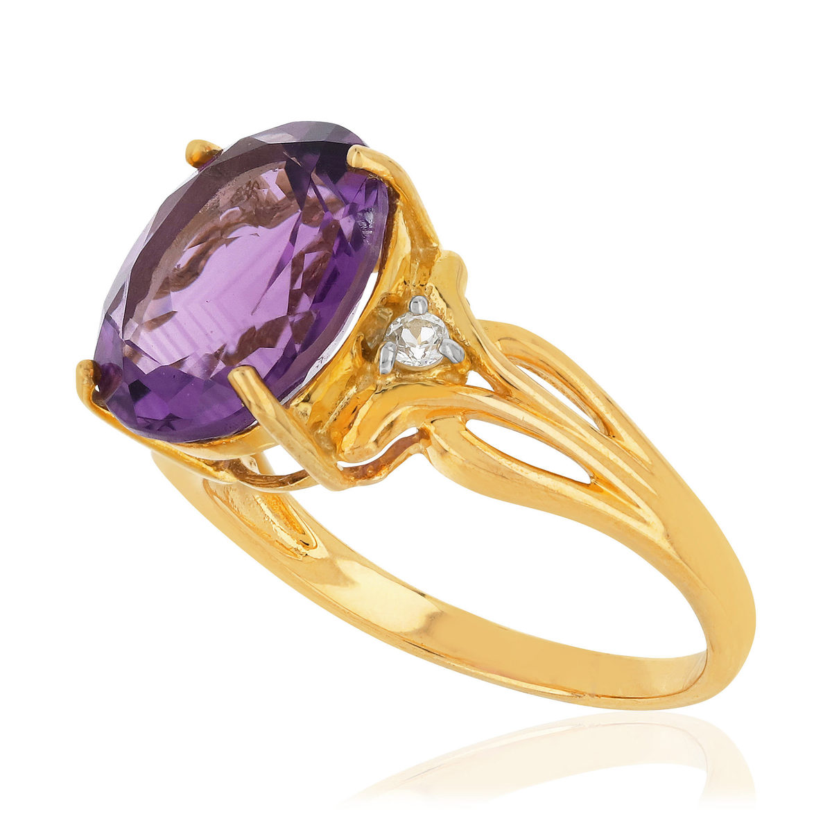 Bague or 375 jaune améthyste ovale et topazes