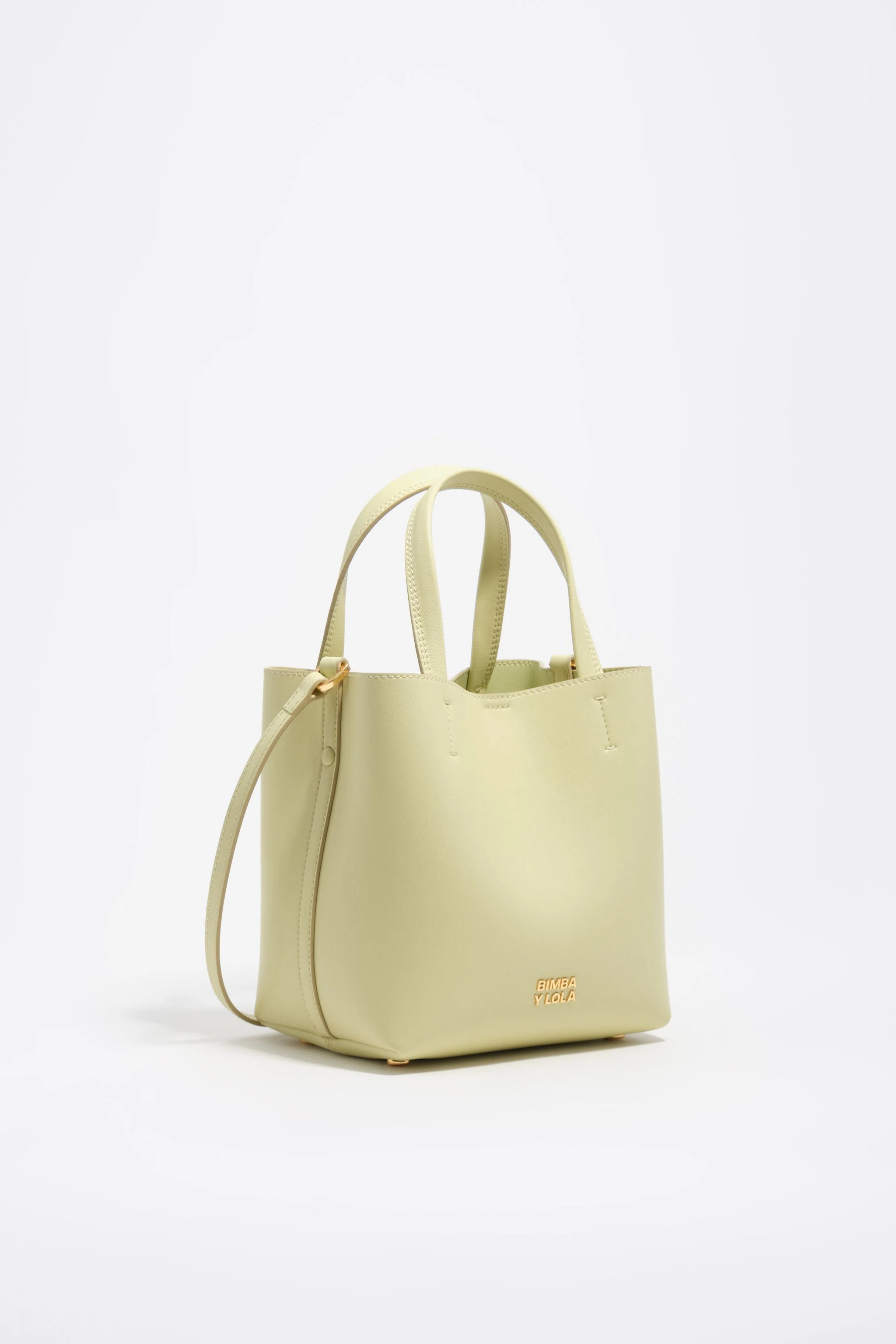 Bolsa pequena de couro verde claro com estampa de Chihuahua.