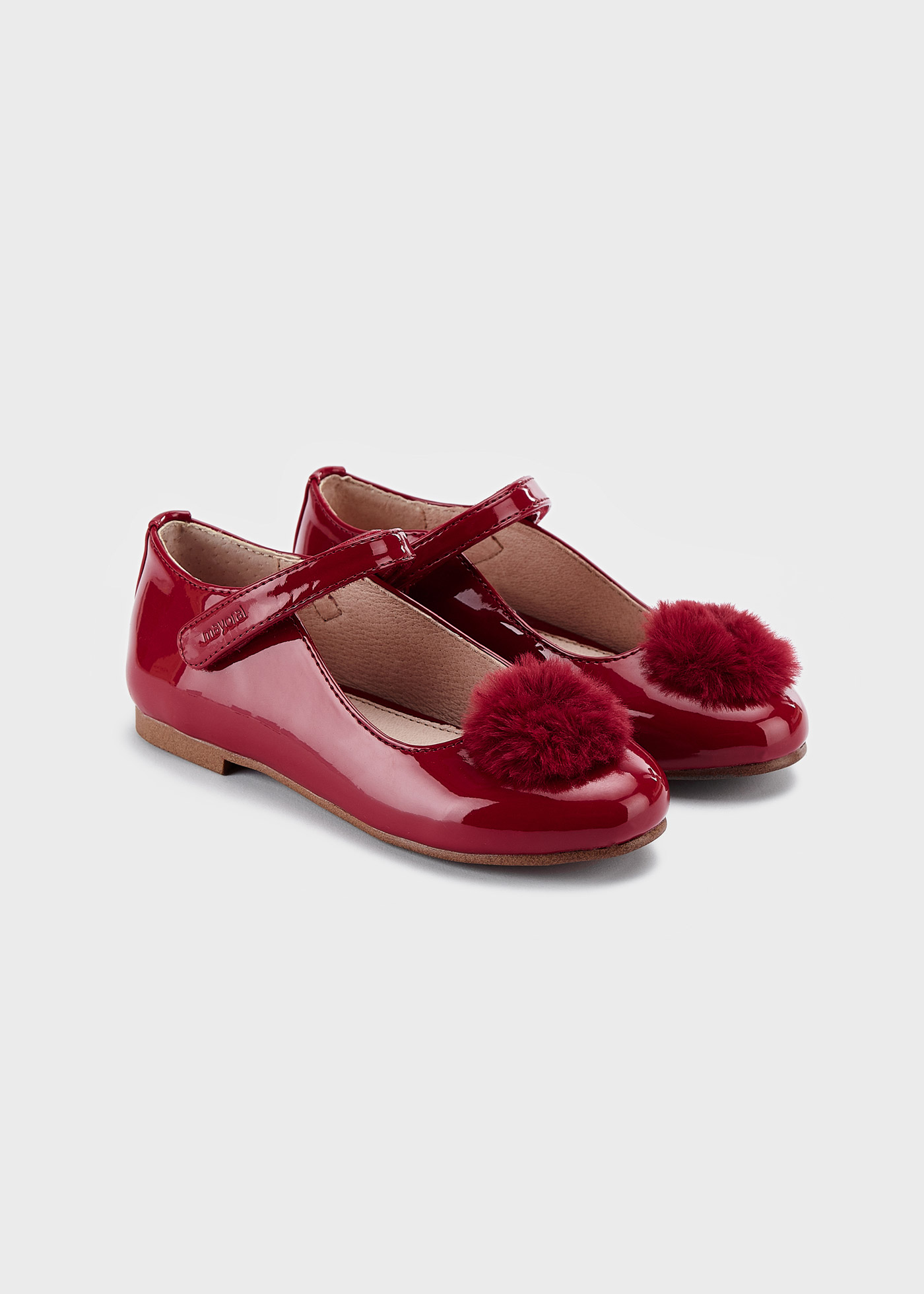 Sapato estilo Mary Jane com palmilha de pompom, em couro sustentável, para meninas.