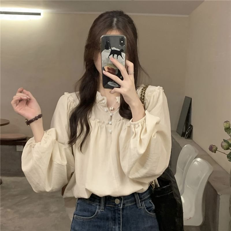 Sienne - Effen blouse met V-hals en ruches