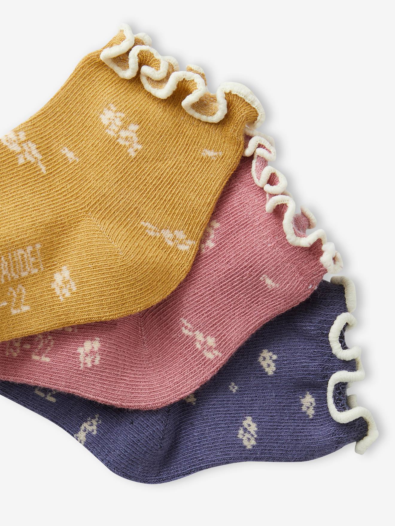 Pacote com 3 pares de meias florais amarelas para bebê menina.