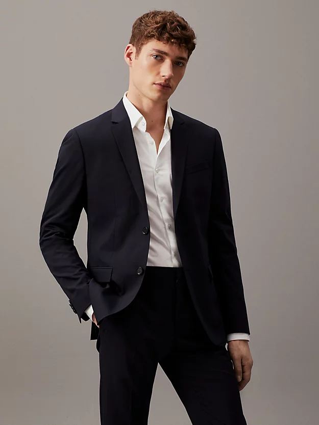 Blazer de abotoamento simples em lã elástica com modelagem slim.