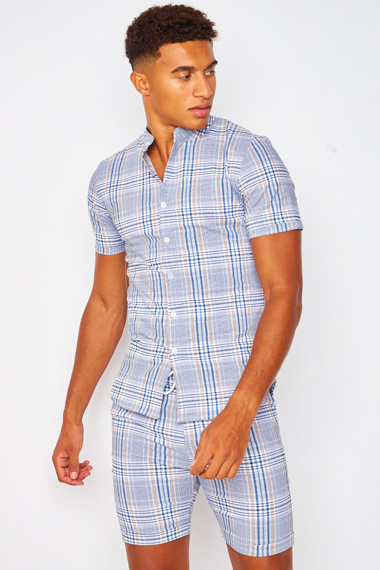 Chemise blanche à carreaux bleus et beiges