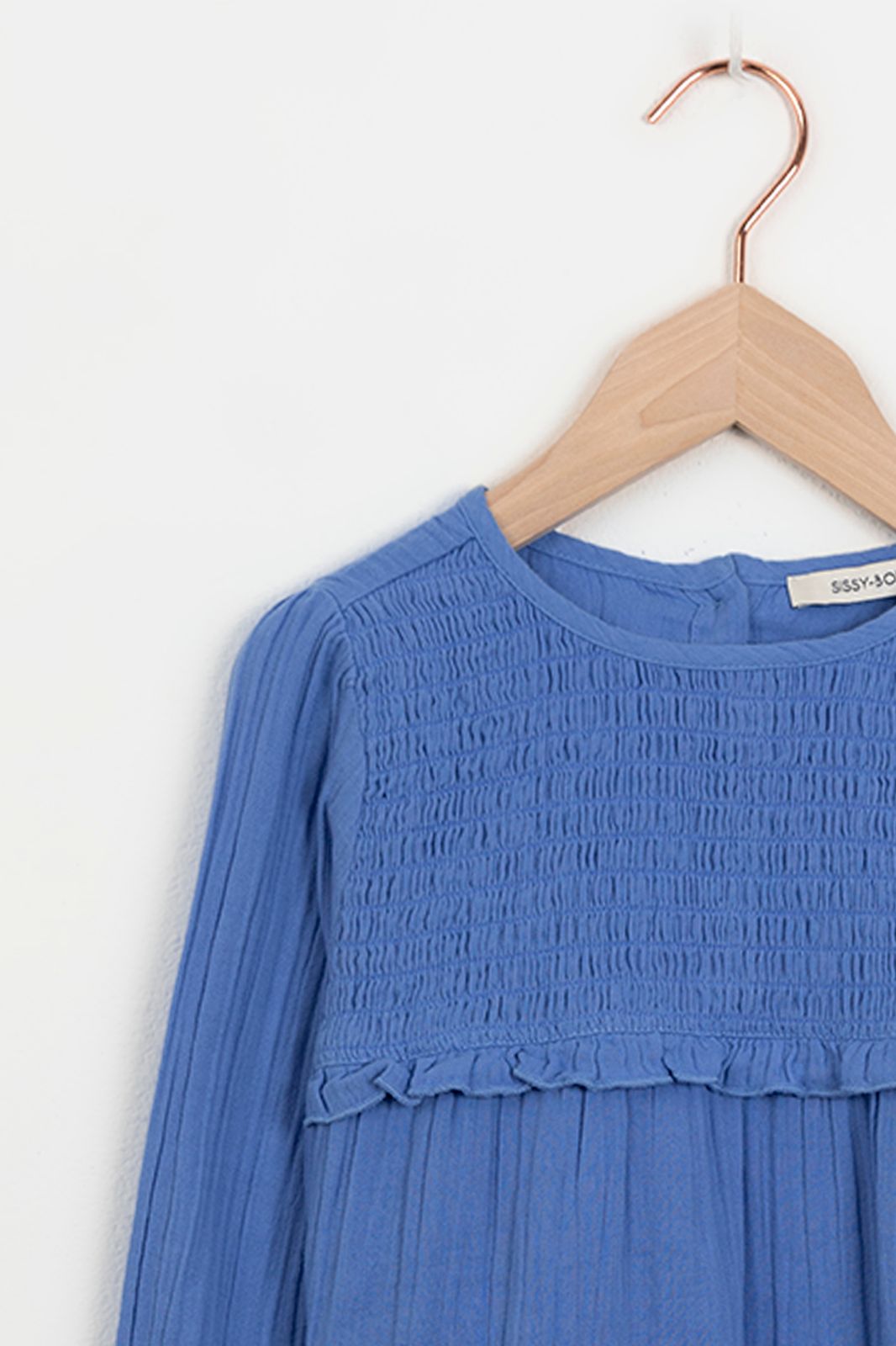 Blauwe blouse met smock detail en ruffles