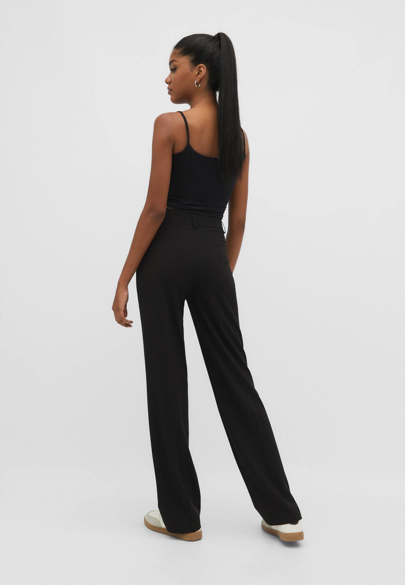 Calças elegantes com detalhe de costura
