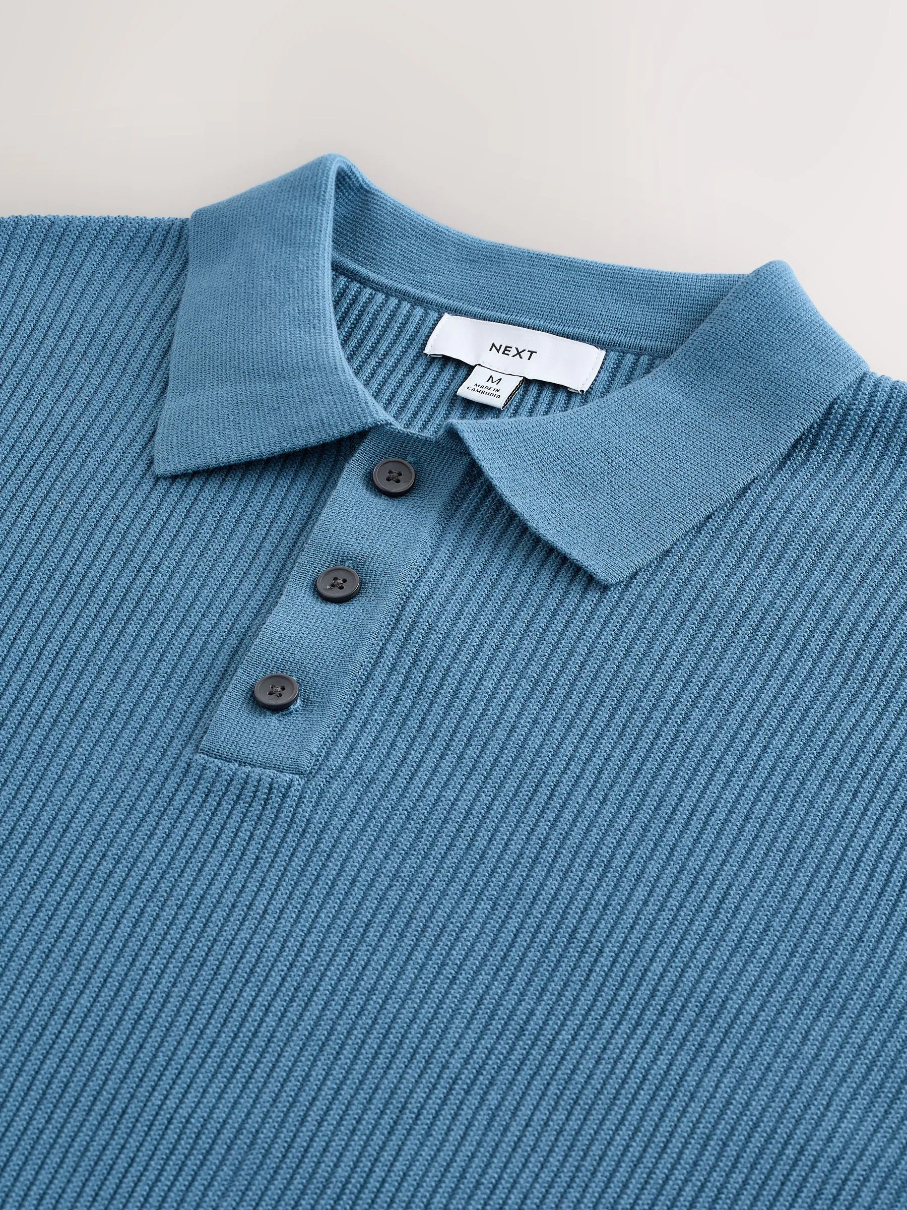 Normaal blauw - Regular fit poloshirt van 100% katoen met korte mouwen, gebreide structuur en ribbels