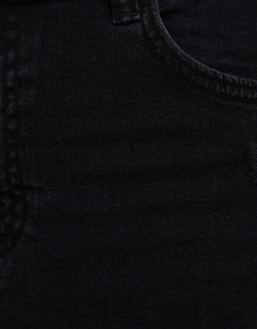 Bermuda jeans rasgada