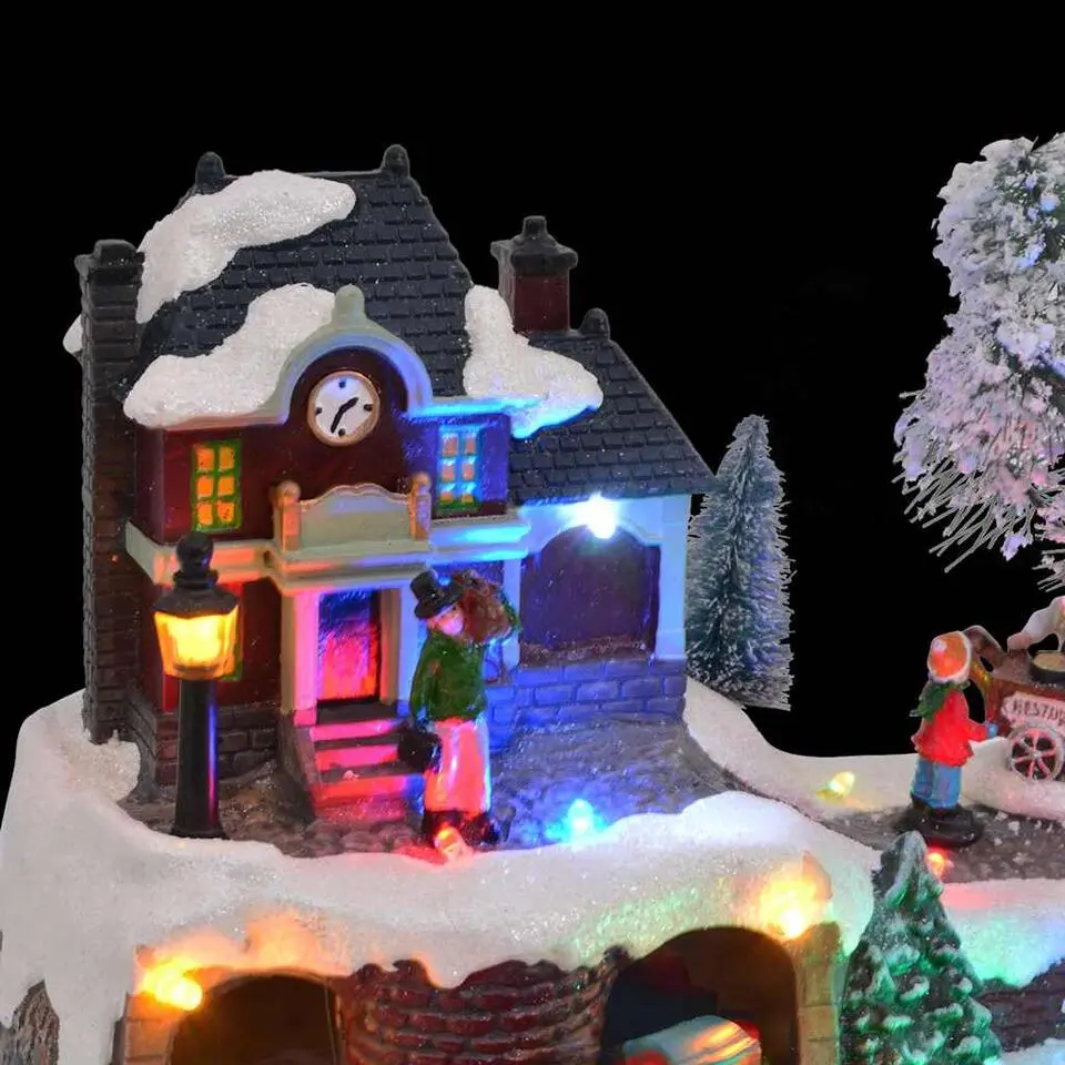 vidaXL - Miniatuur kerstdorp met treinstation - 23,5x16x18,5 cm - Hars
