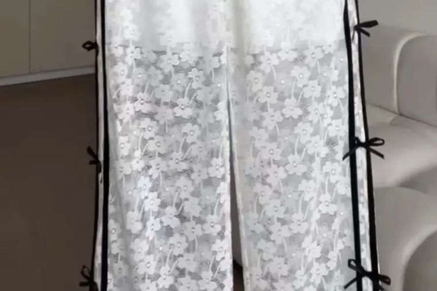 Essere - Elastische taille, bloemenstrik, kanten wijde broek