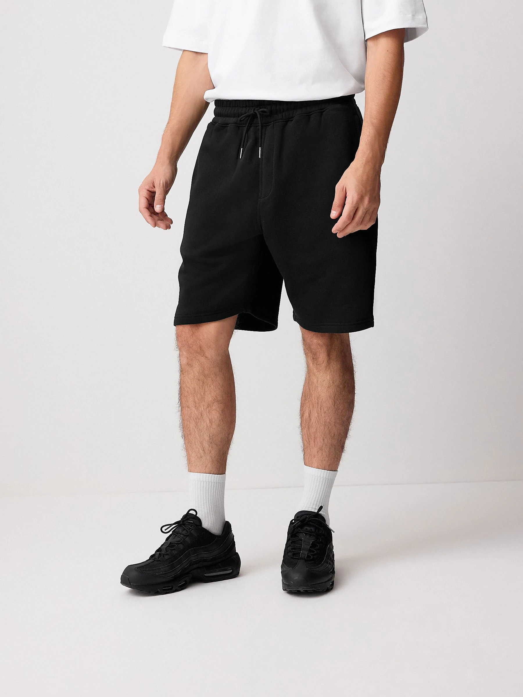 Zwart - Geborstelde jersey shorts met ritszakken