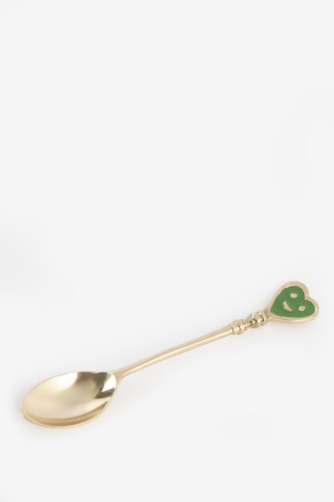 Groene en goudkleurige theelepels met smiley hartjes