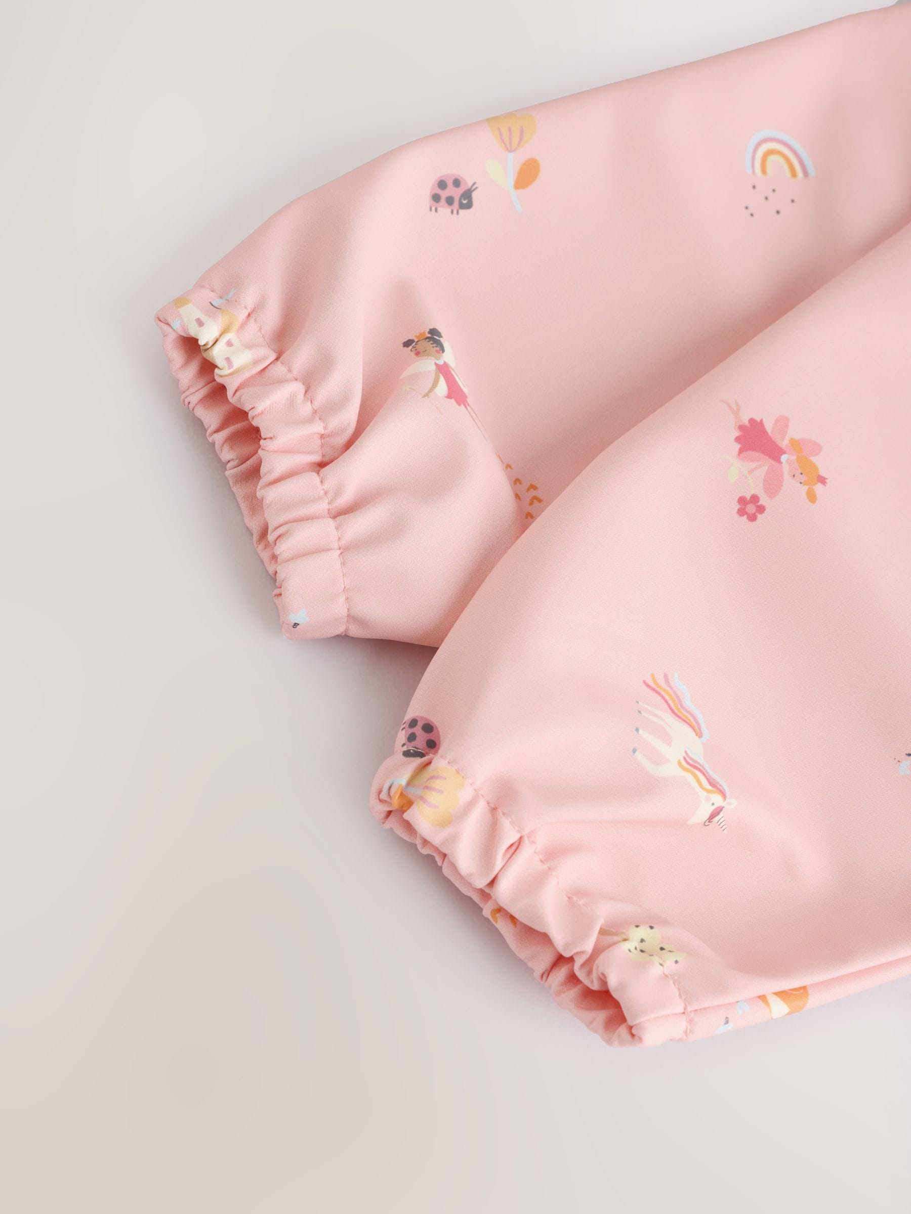 Roze eenhoornfeeën - Slabbetje met mouwen voor spenen en voeden