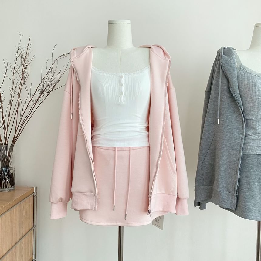 Alhambra - Set: effen hoodie met rits + mini A-lijn rok met trekkoord in de taille