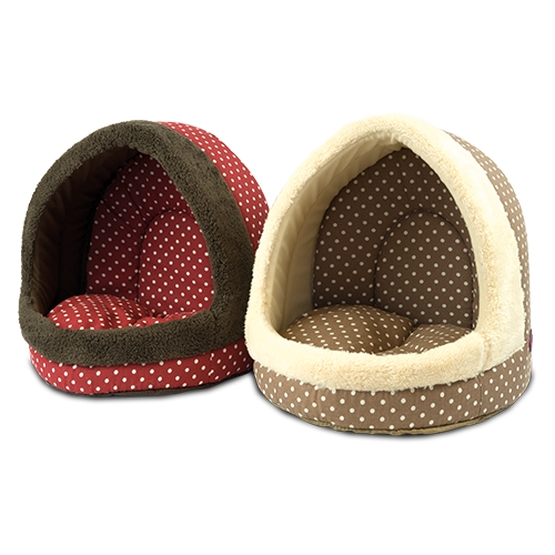 Cama para cães e gatos em formato de caverna com bolinhas vermelhas.