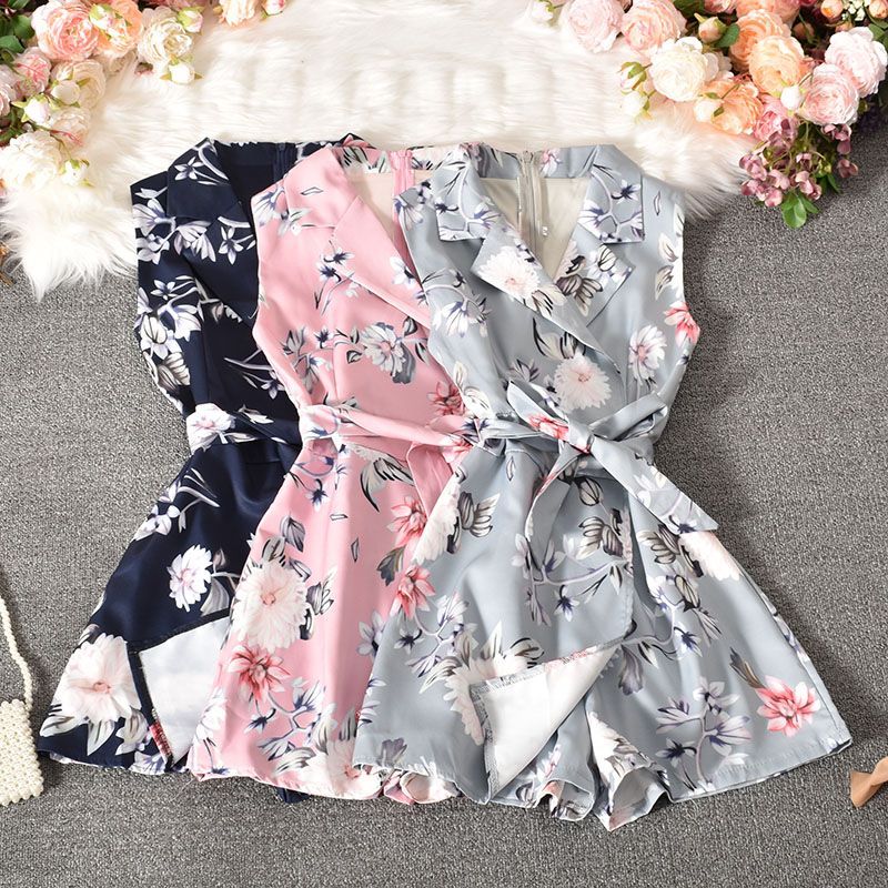 Dudu - Mouwloze romper met bloemenprint en strikceintuur