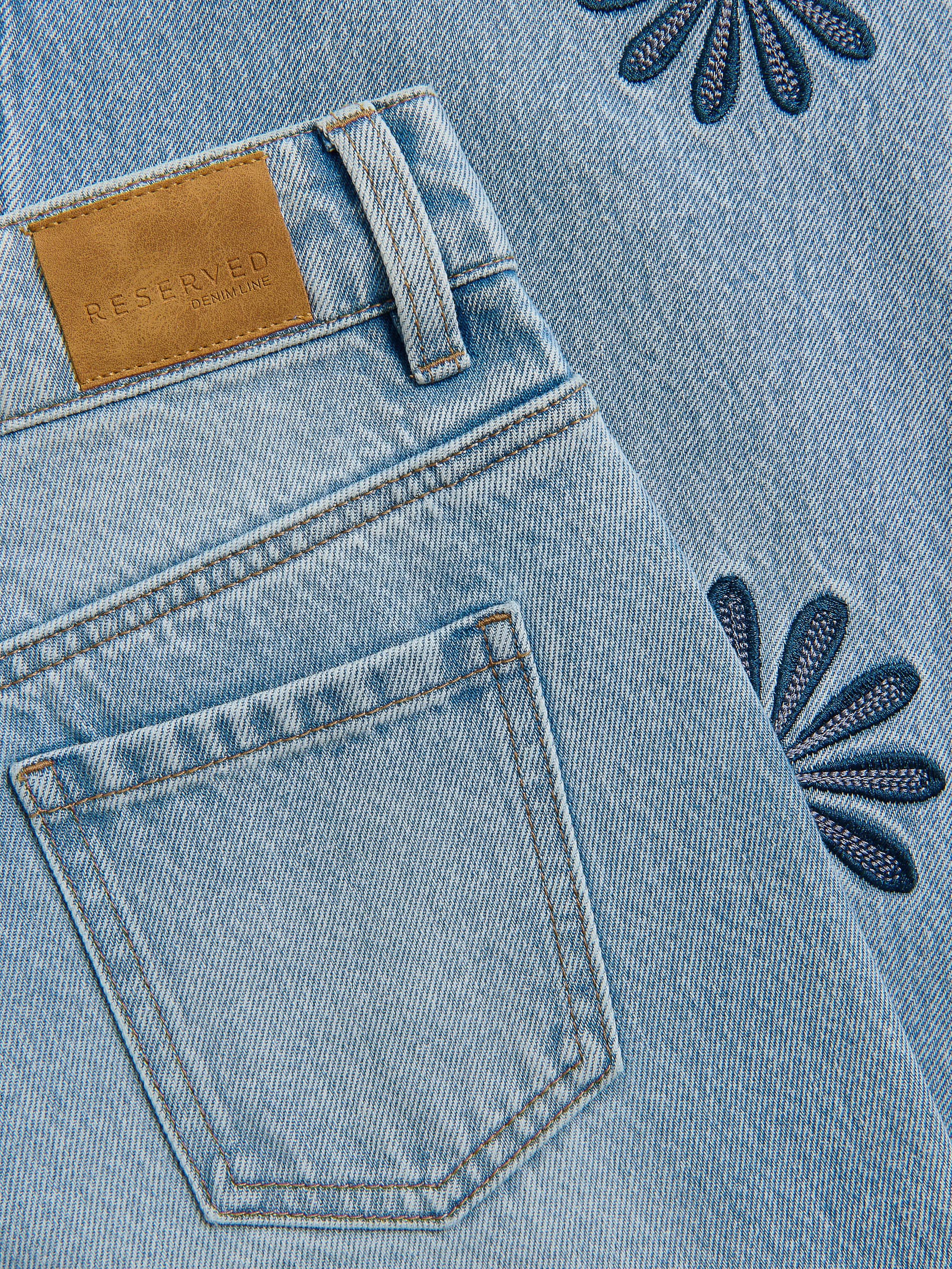 Jeans im Wide leg-Fit mit Stickereidetail