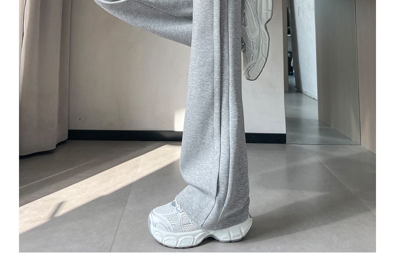 Tel tot 10 - Effen wijd uitlopende broek met trekkoord in de taille (verschillende ontwerpen)