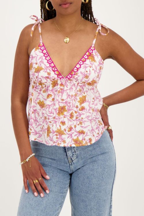 Witte top met roze bloemenprint en strikbandjes