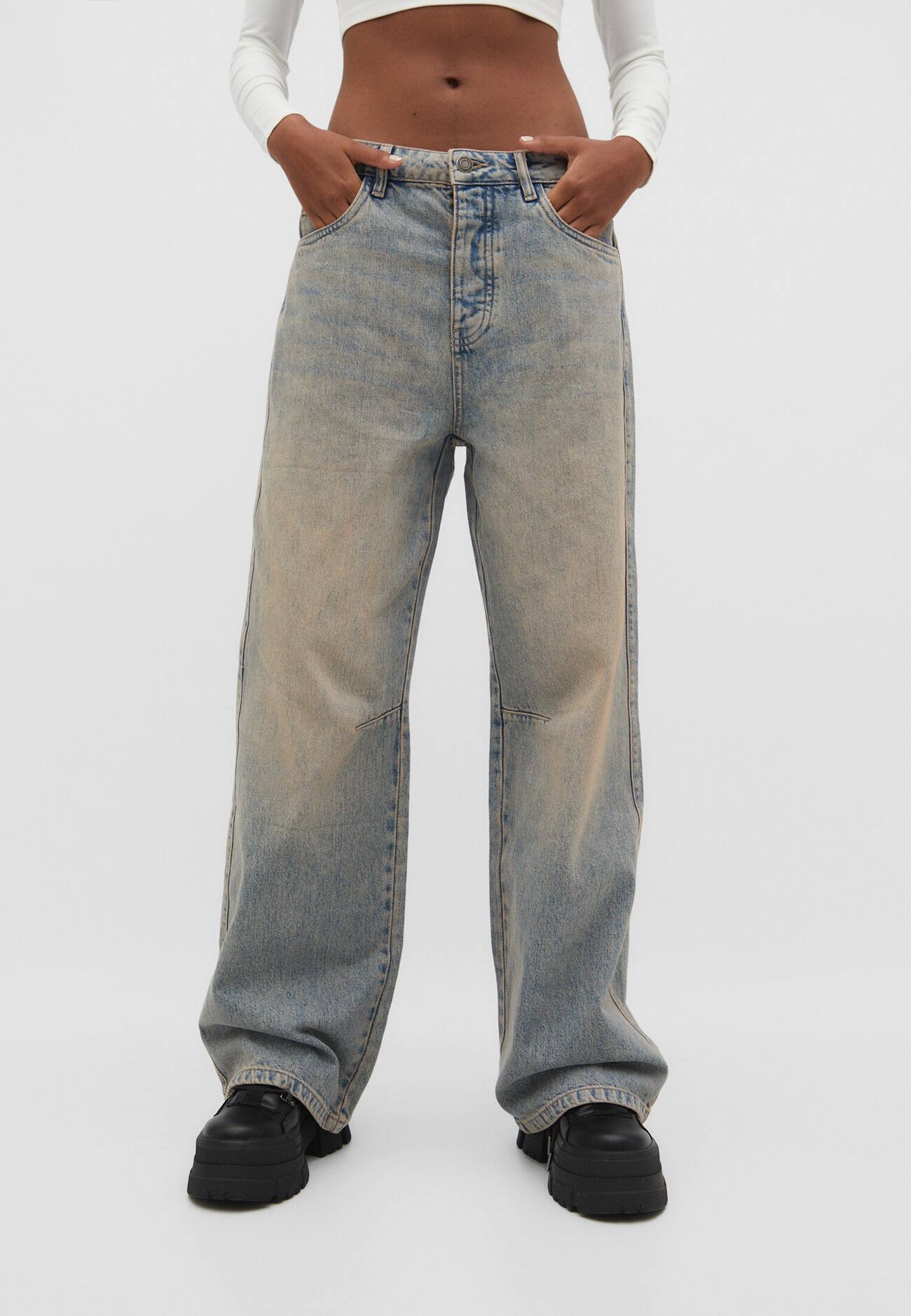 calças jeans largas ajustáveis
