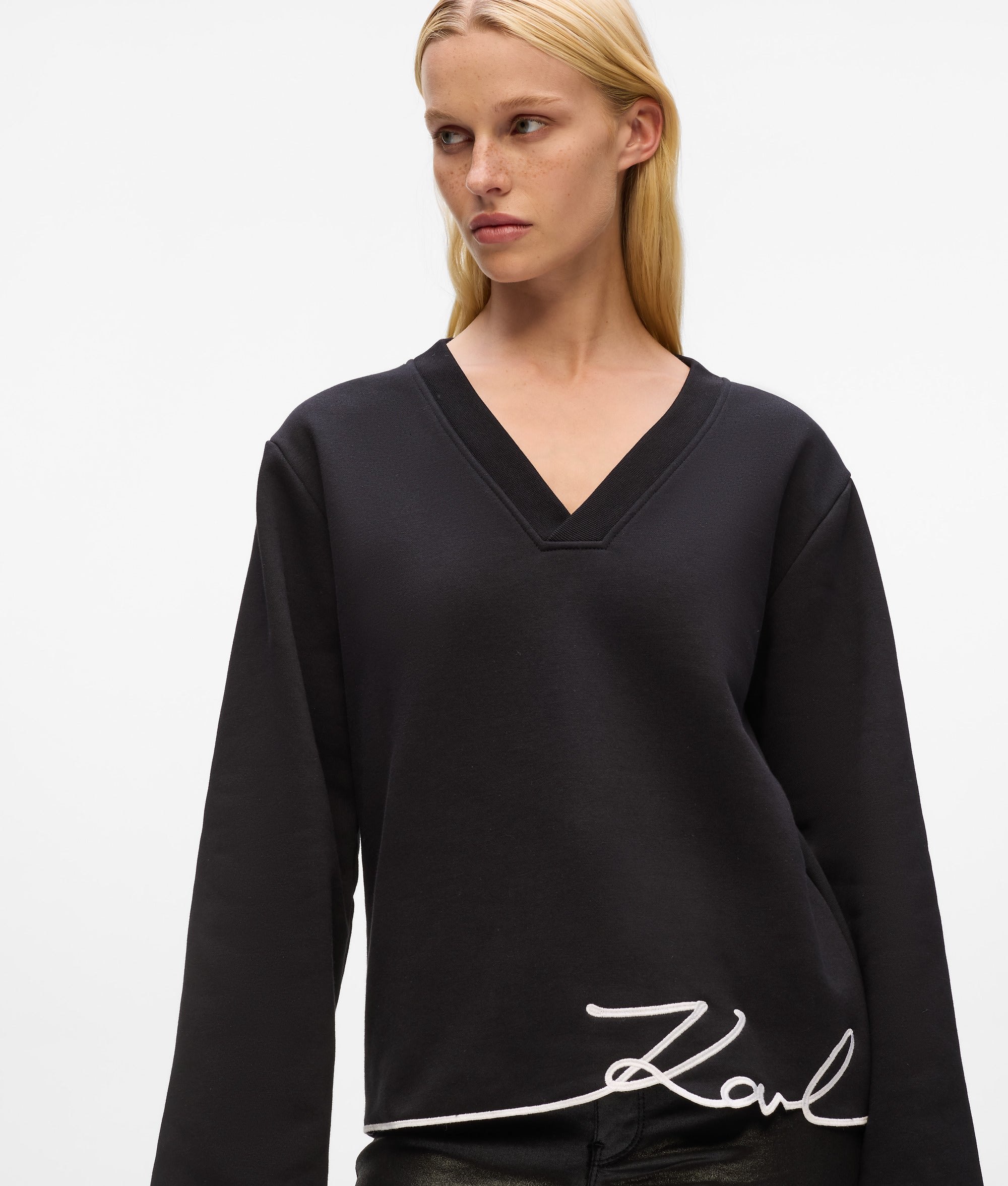 Signature-logo boven de zoom