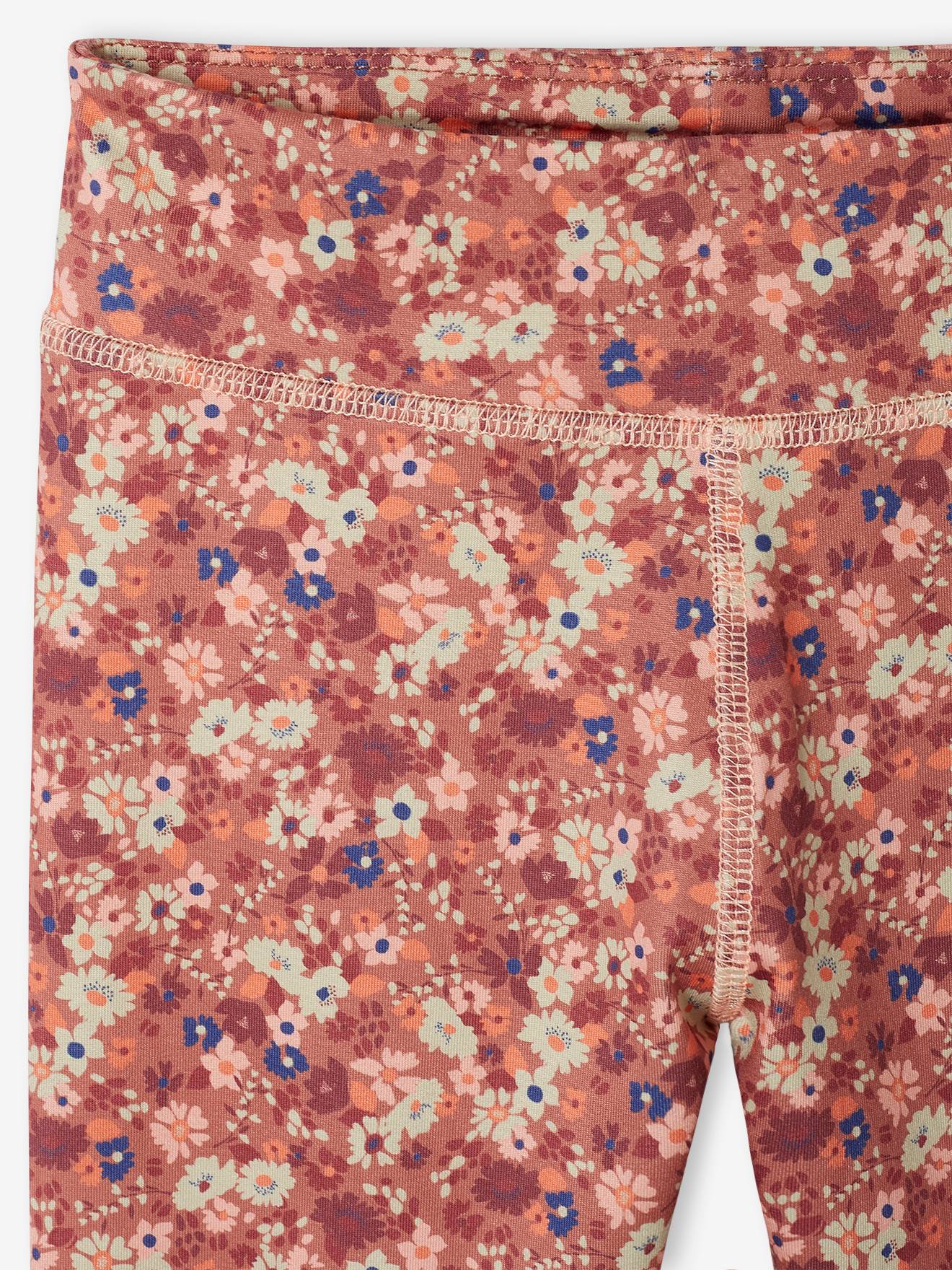 Leggings esportivas infantis azuis em tecido técnico com estampa.