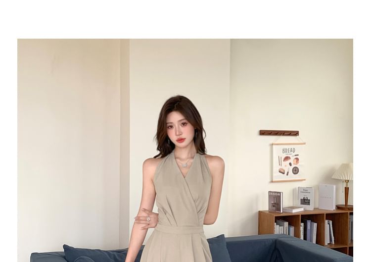 Arabesquito - Mouwloze V-hals jumpsuit met wijde pijpen
