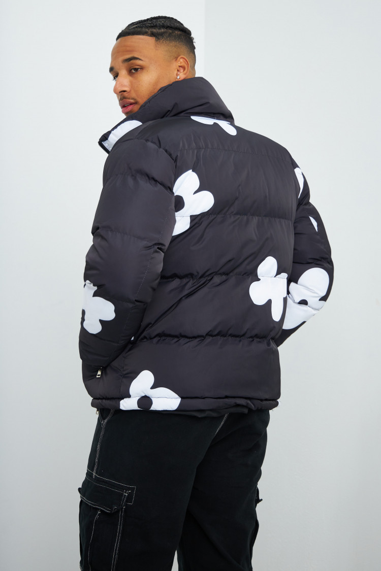 Doudoune noir et blanche matelassée à fleurs