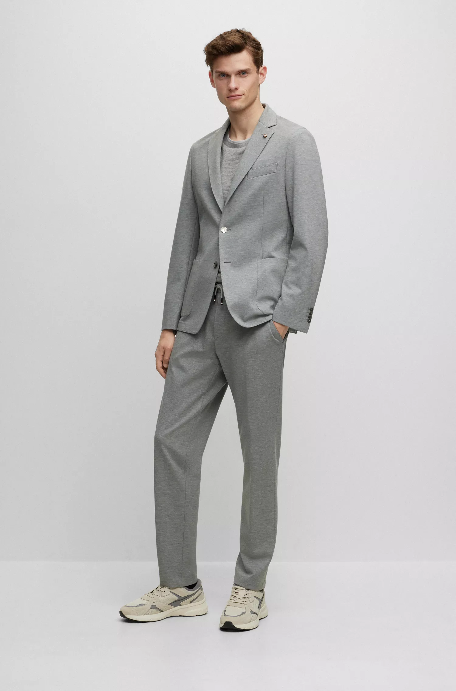 Calça BOSS preta de corte slim em malha interlock mesclada