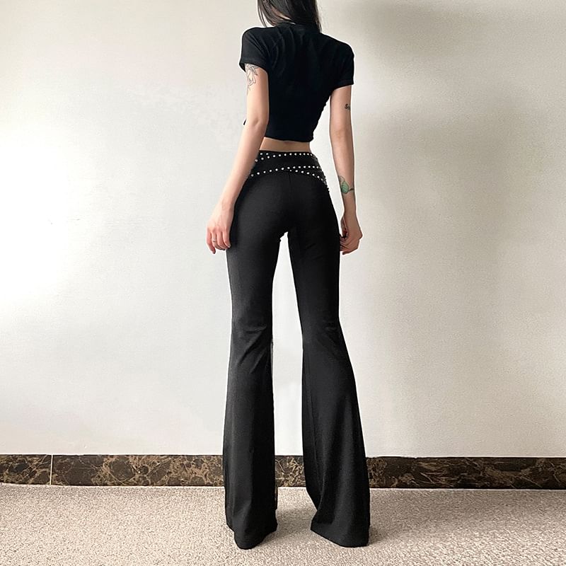 Sosana - Slim-fit bootcut broek met lage taille, accentuerende studs en riem