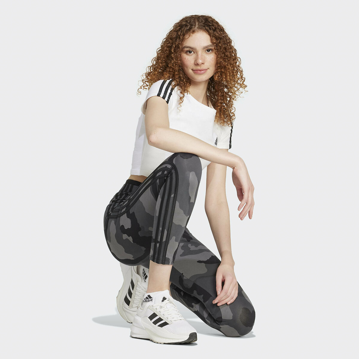 ADIDAS SPORTSWEAR<br>Legging Essentials 3 listras, estampa camuflada, 7/8