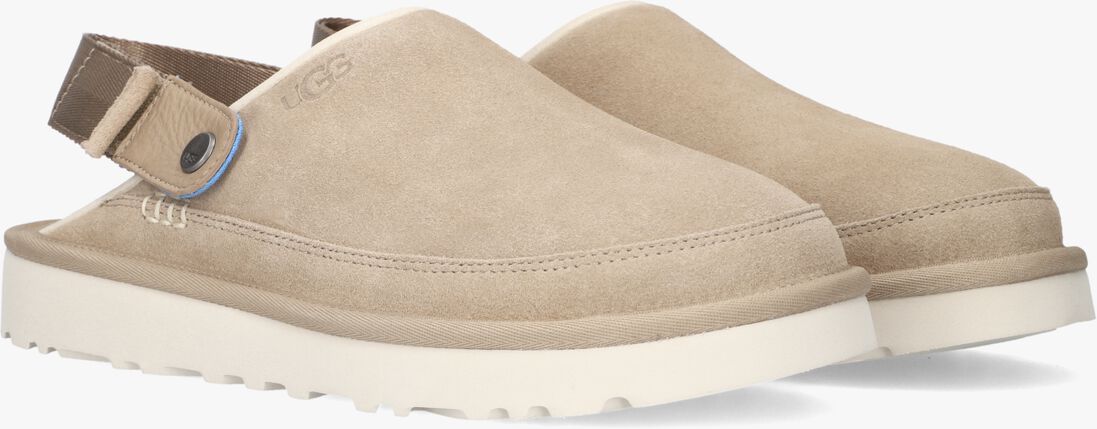 beige ugg slippers marketing model