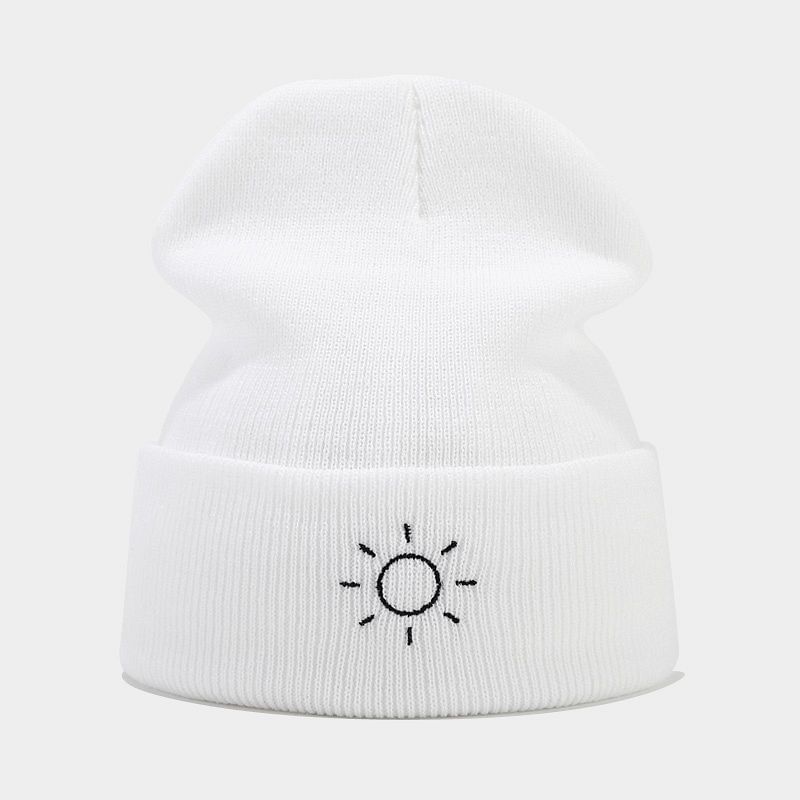KOKOBOLA - Gebreide muts met geborduurde zon