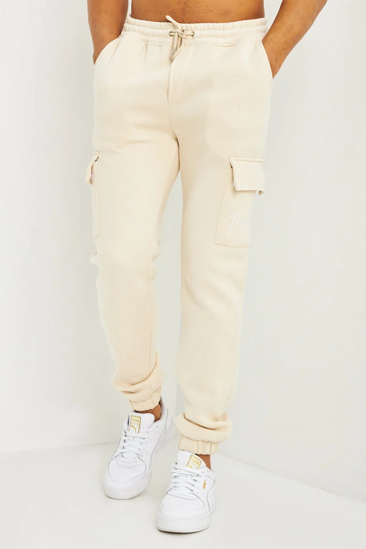 Pantalon de jogging beige clair poches cargo inscription Brentiny