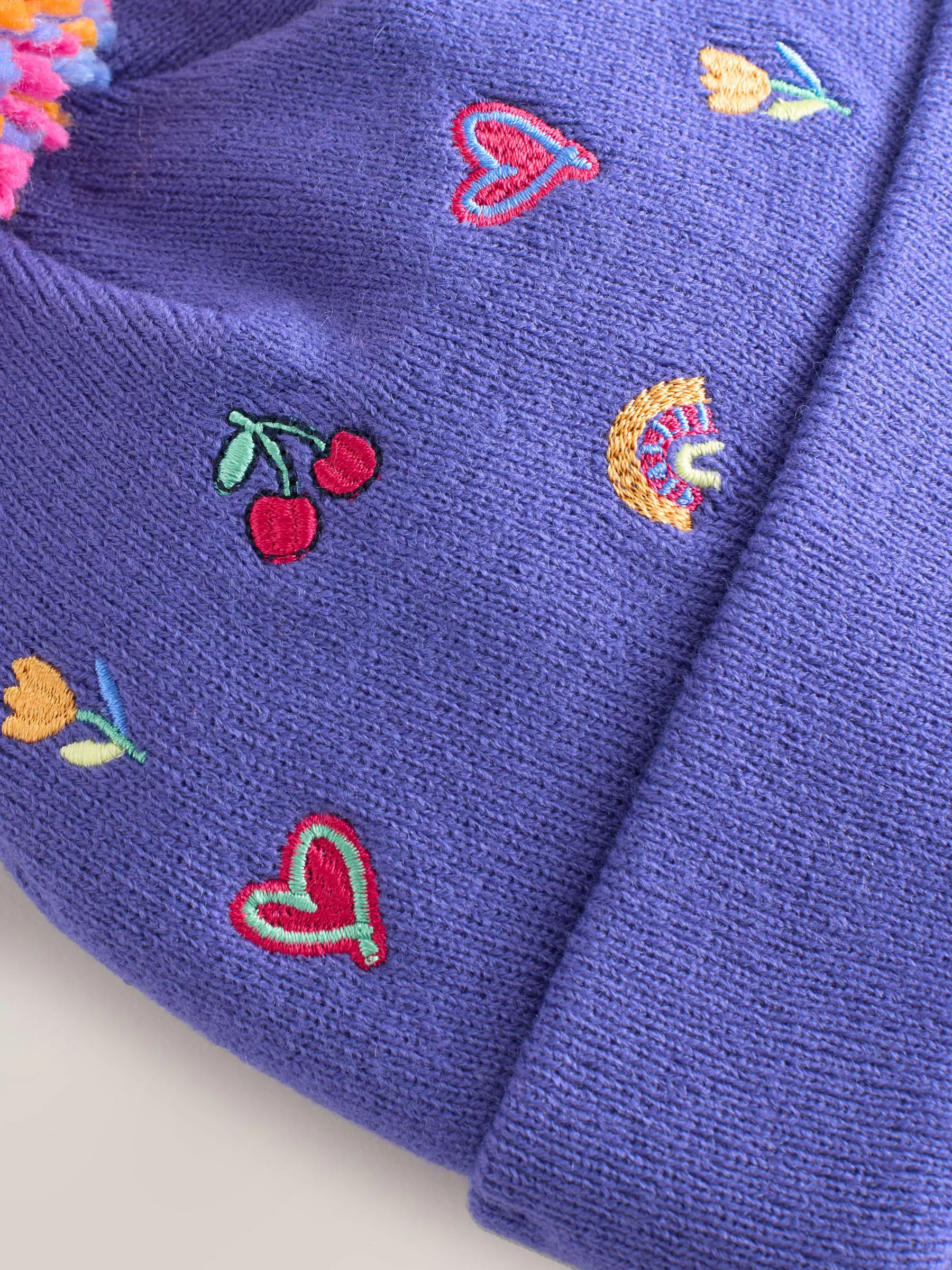 Multi - Geborduurde Beanie-muts met pompon (3mnd-10jr)