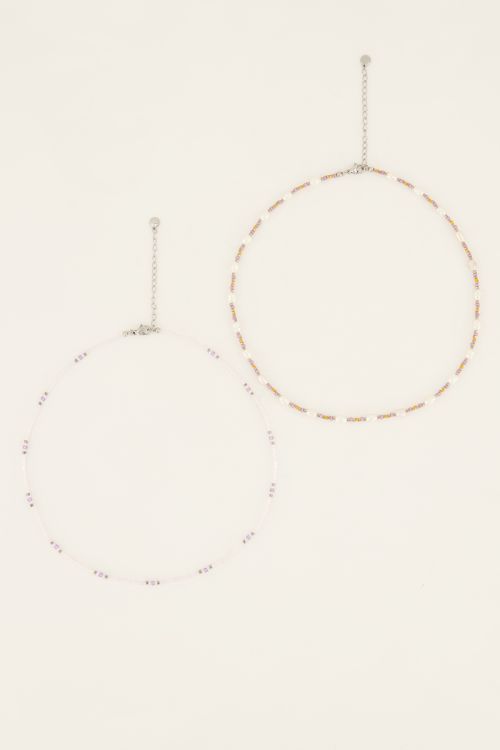 Souvenir oranje & lila kettingen set met kralen en parels