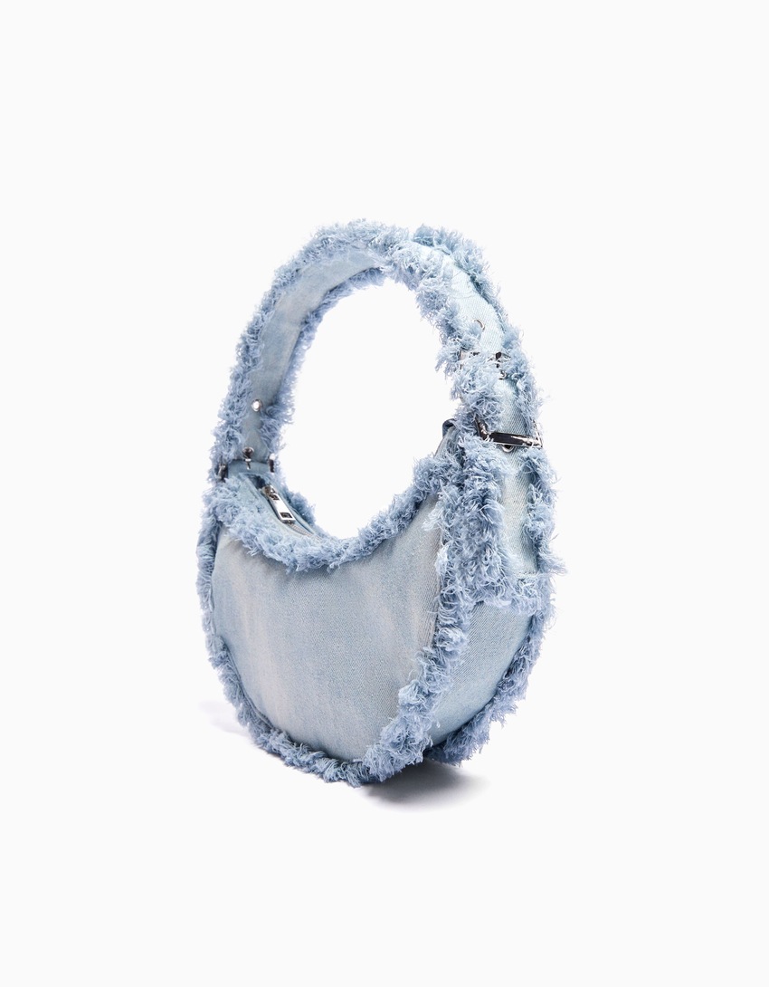 Bolsa de ombro em jeans com franjas