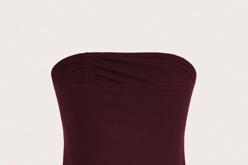 Asiris - Strapless asymmetrische, effen crop top