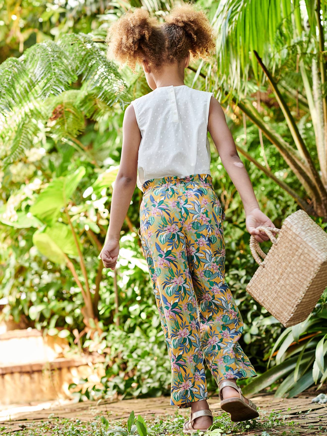 Calças com estampa floral mostarda