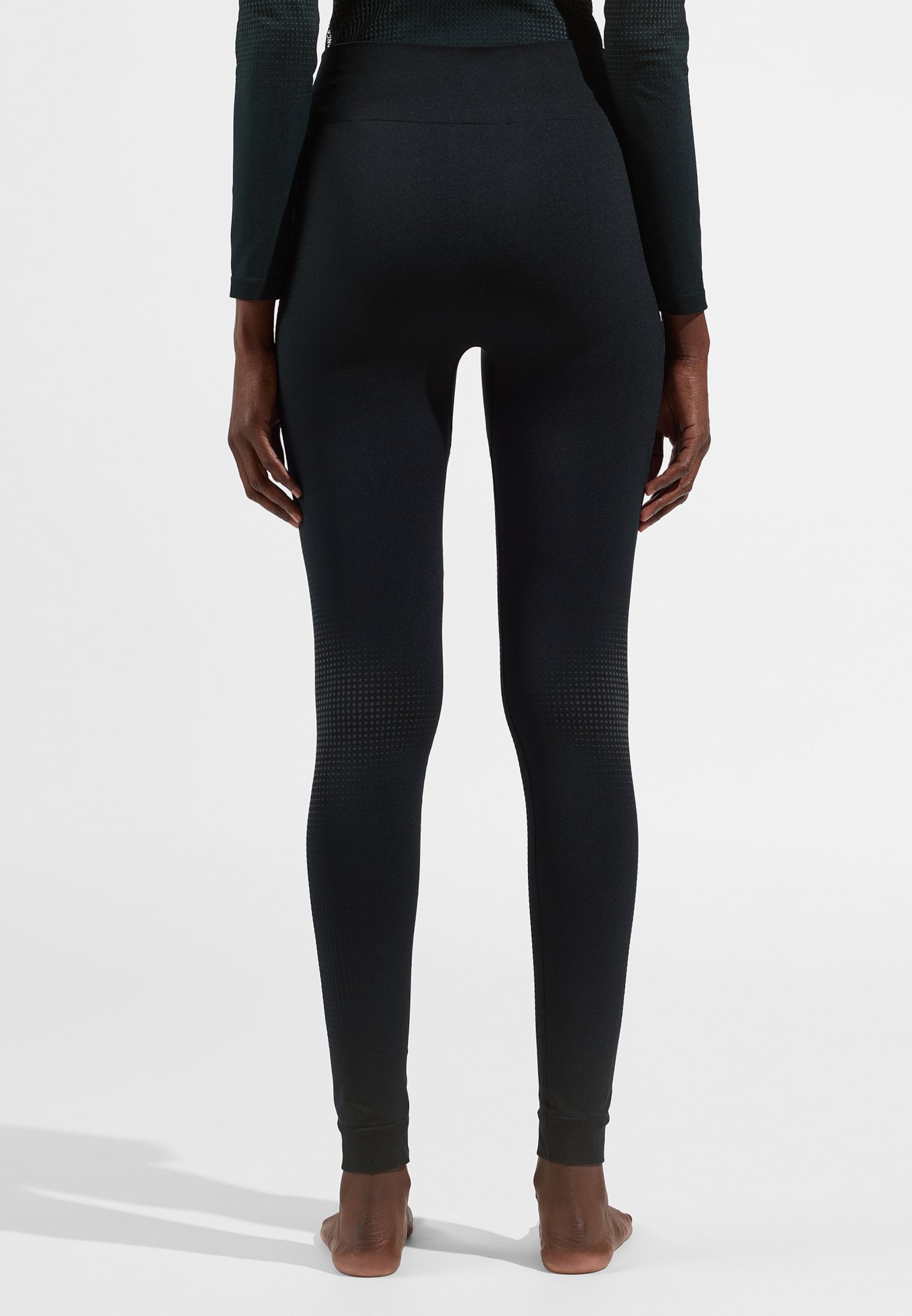 Performance Warm Base Layer Tights in black - odlo graphite grey