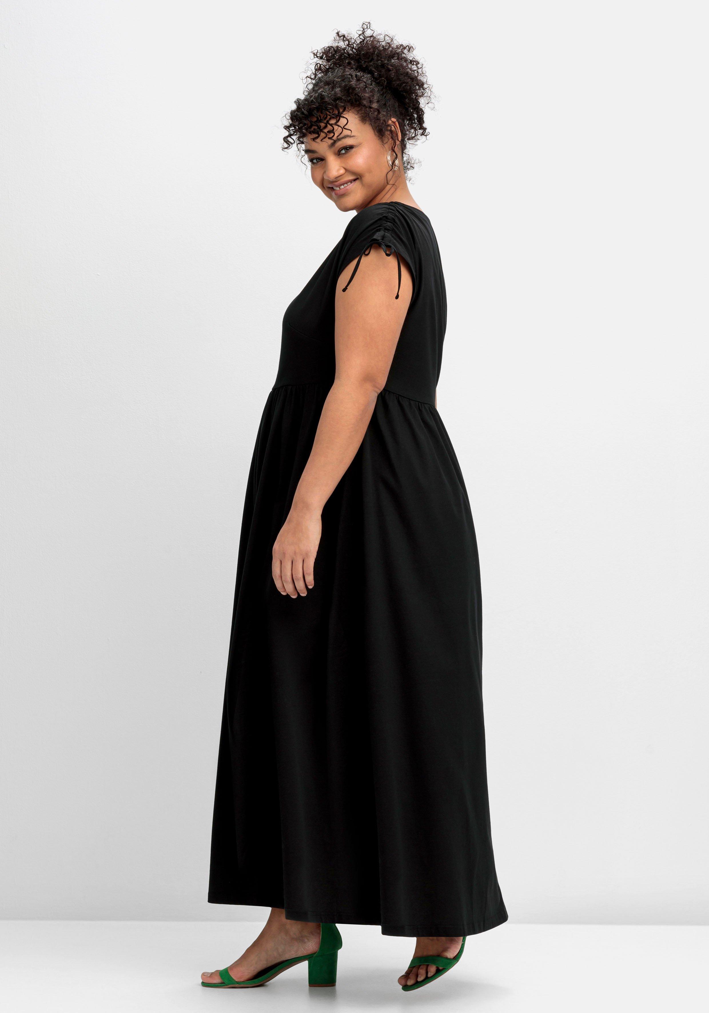 Jerseykleid mit weitem Rock und V-Ausschnitt